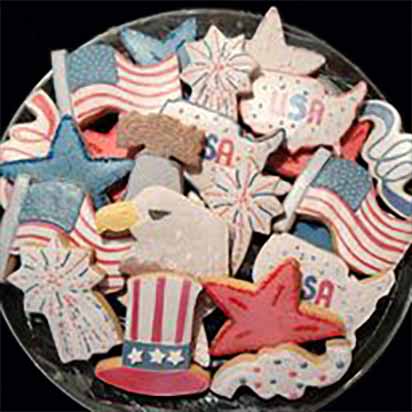 Fourth of July cookie tray: Hat, eagle, liberty bell, stars, flags, US, fireworks.