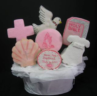 Baptism cookie bouquet: Bible, dove, cross, baptism gown, praying hands, and shell.