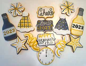 New Year's Cookies: Clock, bottles of champagne, party hats, decorations, and stars.