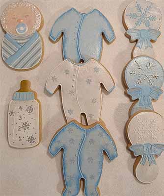 Baby cookies: Baby,  onesies, rattles and bottles.