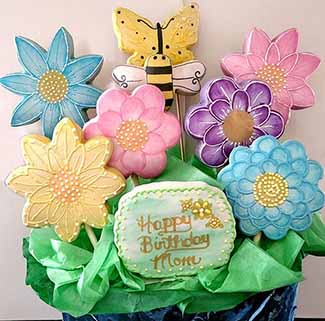 Birthday cookie bouquet: flowers, bee, and butterfly.