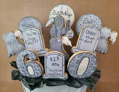 Birthday cookie bouquet:  Tomb stones, grimm reaper, buzzards, and 60.