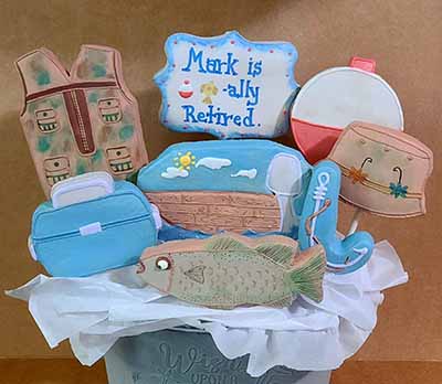 Retirement cookie bouquet: Fish, boat, bobber, hat, vest, and tackle box.and hook.