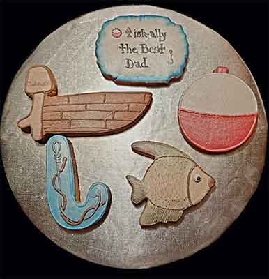 Retirement cookie tray: Fish, boat, bobber, and hook.