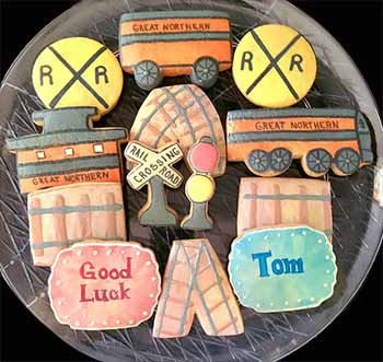 Retirement cookie tray: Train, tracks, signs, and lights.