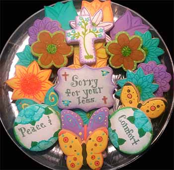 Sympathy cookie tray: Cross, butterflies, and flowers.