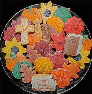 Sympathy cookie tray: Flowers, pumpkins, leaves, cross, and Bible.