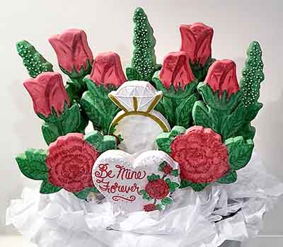 Valentine cookie bouquet: Heart, diamond ring ad roses.