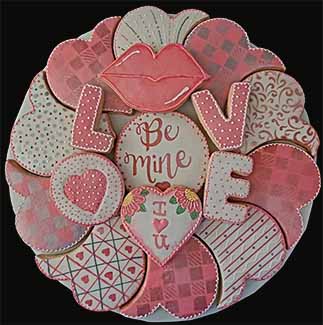 Valentine Cookie Tray: Hearts, letters that spell LOVE, and a message.