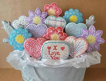 Valentine cookie bouquet: Hearts and flowers.