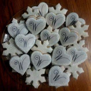 Wedding cookie tray: Monogrammed hearts and snowflakes.