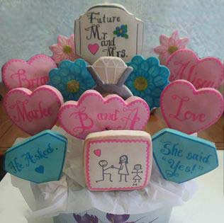 Marriage proposal cookie bouquet: Hearts, diamonds, and  cartoon marriage proposal.